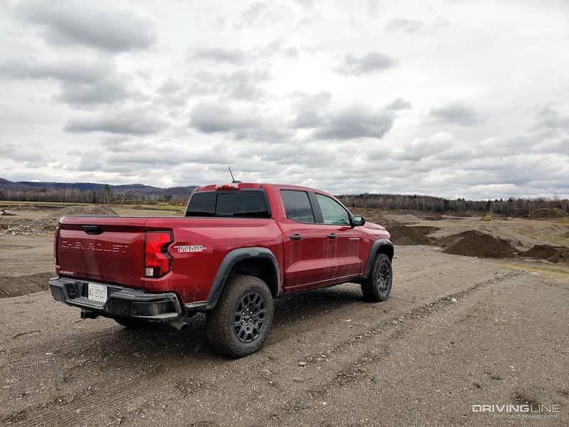 2023 Chevrolet Colorado Trail Boss rear view looking out over the sand dunes